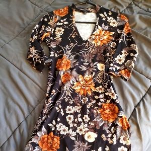 Forever 21 M neutral flowers. Spandex blend. Bodycon mid length dress